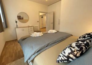Łóżko lub łóżka w pokoju w obiekcie Apartmány Herc
