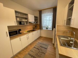 Kuchnia lub aneks kuchenny w obiekcie Apartmány Herc