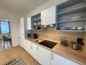 Kuchnia lub aneks kuchenny w obiekcie Apartmány Herc