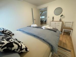 Łóżko lub łóżka w pokoju w obiekcie Apartmány Herc