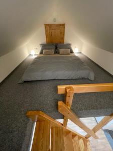 Łóżko lub łóżka w pokoju w obiekcie Apartmány Herc