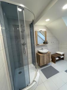Łazienka w obiekcie Apartmány Herc