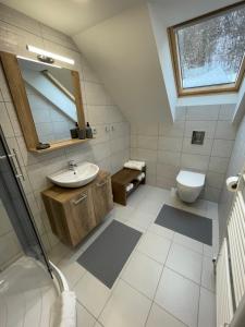 Łazienka w obiekcie Apartmány Herc
