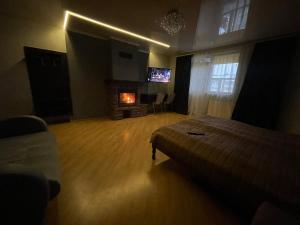 TV a/nebo společenská místnost v ubytování LIKE HOTEL
