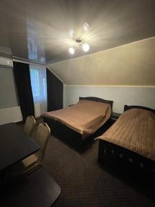 Postel nebo postele na pokoji v ubytování LIKE HOTEL