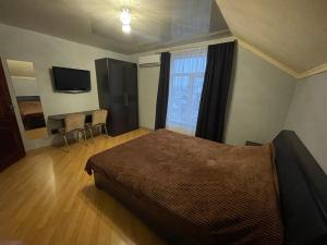 TV a/nebo společenská místnost v ubytování LIKE HOTEL