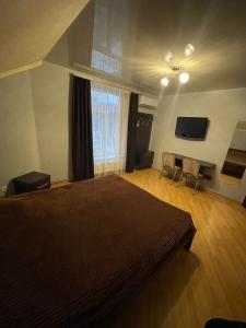 TV a/nebo společenská místnost v ubytování LIKE HOTEL