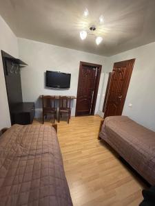 TV a/nebo společenská místnost v ubytování LIKE HOTEL