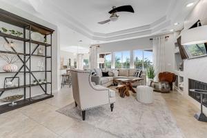 a living room with a couch and a table at Golfer's Vista in Scottsdale