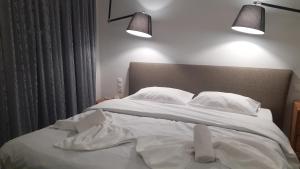 Postel nebo postele na pokoji v ubytování GIANNIS