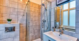Kúpeľňa v ubytovaní Apartamenty na Deptaku by Royal Aparts + 14 fotografií