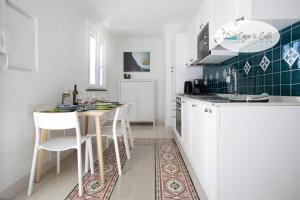 Kuchyňa alebo kuchynka v ubytovaní Casa Le Calle + 17 fotografií