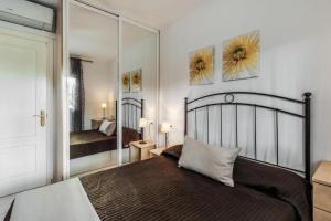 Ein Bett oder Betten in einem Zimmer der Unterkunft Perfect Family Apartment in Acapulco Playa, Nerja