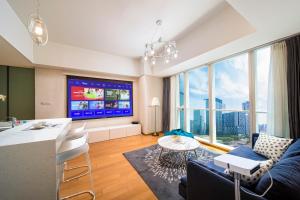 TV a/nebo společenská místnost v ubytování S6 Service Apartment（Chengdu Chunxi Road Taikoo Li Branch）