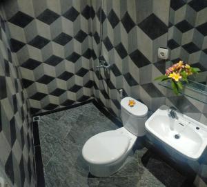 O baie la Rion Hostel Bogor