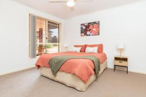 Ένα ή περισσότερα κρεβάτια σε δωμάτιο στο Lakeview on Victoria