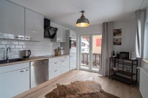 Kuchyň nebo kuchyňský kout v ubytování Haus Fichtl, Alpenblick 402 oder Nebelhornblick 403