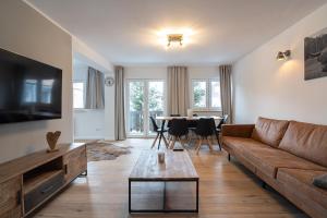 TV a/nebo společenská místnost v ubytování Haus Fichtl, Alpenblick 402 oder Nebelhornblick 403