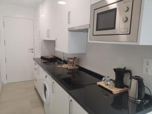 Kuchyň nebo kuchyňský kout v ubytování Love Rent4 Málaga loft