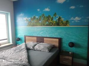 Posteľ alebo postele v izbe v ubytovaní Yakuzza Apartments