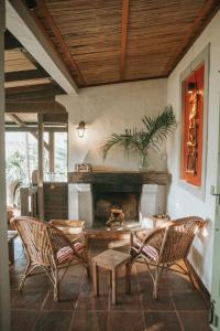 Posezení v ubytování La Vieille Cheminée, Tropical Farm & Eco-Lodges