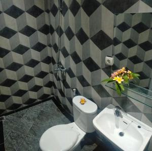 O baie la Rion Hostel Bogor