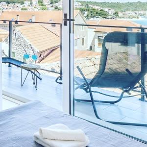 Balkón nebo terasa v ubytování Luxury apartments SKALINADA near beaches, Tisno - Dalmatia