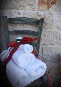 Postel nebo postele na pokoji v ubytování Trullo Sweet Trullo