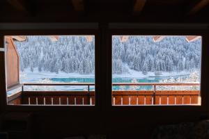 Afbeelding uit fotogalerij van Mansarda vista lago in Auronzo di Cadore