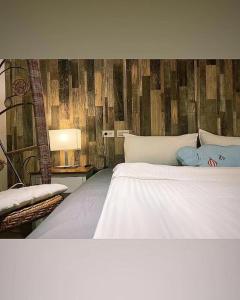 Łóżko lub łóżka w pokoju w obiekcie M Taipei Hotel
