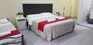 Postel nebo postele na pokoji v ubytování Lili & Aurora Home