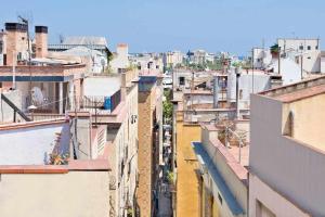 an aerial view of a city with buildings at Inspired Apartments Barcelona in Barcelona