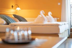 Posteľ alebo postele v izbe v ubytovaní Hotel Vyhlídka