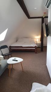 Postel nebo postele na pokoji v ubytování Ubytování v soukromí - Apartmán MERAN