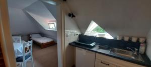 Kuchyň nebo kuchyňský kout v ubytování Ubytování v soukromí - Apartmán MERAN