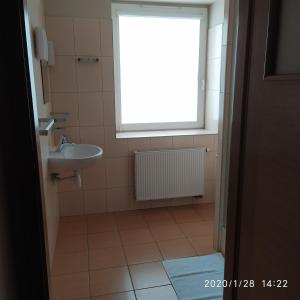 Kúpeľňa v ubytovaní Zawoja1560 Apartamenty przy Aptece