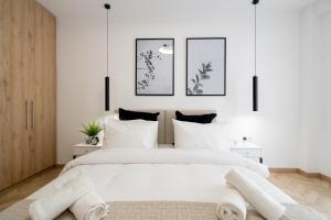 Posteľ alebo postele v izbe v ubytovaní Pagrati's best apartment
