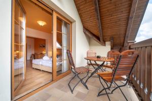 Posteľ alebo postele v izbe v ubytovaní Hotel Vyhlídka