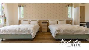 Letto o letti in una camera di 花蓮晨風星語民宿Sun Star B&B