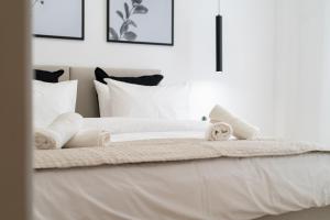Posteľ alebo postele v izbe v ubytovaní Pagrati's best apartment