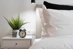 Posteľ alebo postele v izbe v ubytovaní Pagrati's best apartment