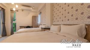 Letto o letti in una camera di 花蓮晨風星語民宿Sun Star B&B