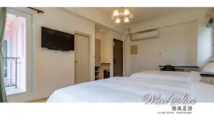 Letto o letti in una camera di 花蓮晨風星語民宿Sun Star B&B