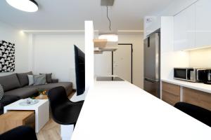 Kuchyňa alebo kuchynka v ubytovaní Pagrati's best apartment