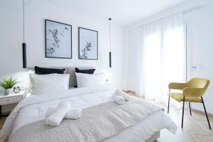 Posteľ alebo postele v izbe v ubytovaní Pagrati's best apartment