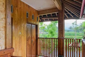 Photo de la galerie de l'établissement Lesehan Cahaya Tetebatu Inn Syariah at Desa Wisata, à Tetebatu 25 autres photos