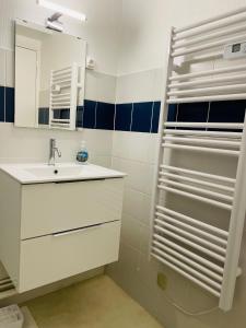 Koupelna v ubytování Bel appartement au cœur de Stella-Plage + 16 fotografií