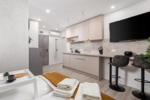 Kuchyň nebo kuchyňský kout v ubytování Apartments Penkala