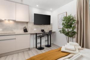 TV a/nebo společenská místnost v ubytování Apartments Penkala