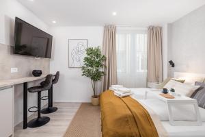 TV a/nebo společenská místnost v ubytování Apartments Penkala